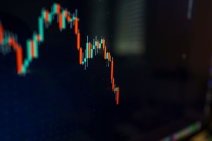 Candlestick chart displaying a bearish trend, representing stock market crash, financial loss, and economic recession