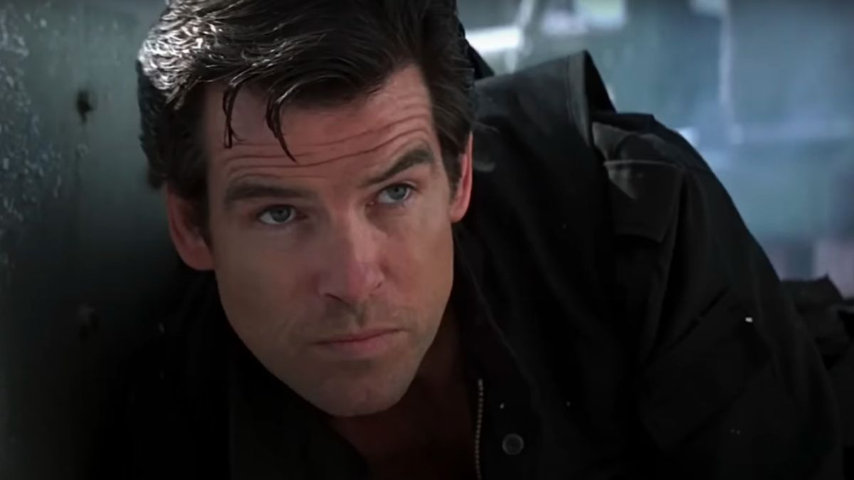 Pierce Brosnan taking cover from gunfire in Goldeneye.