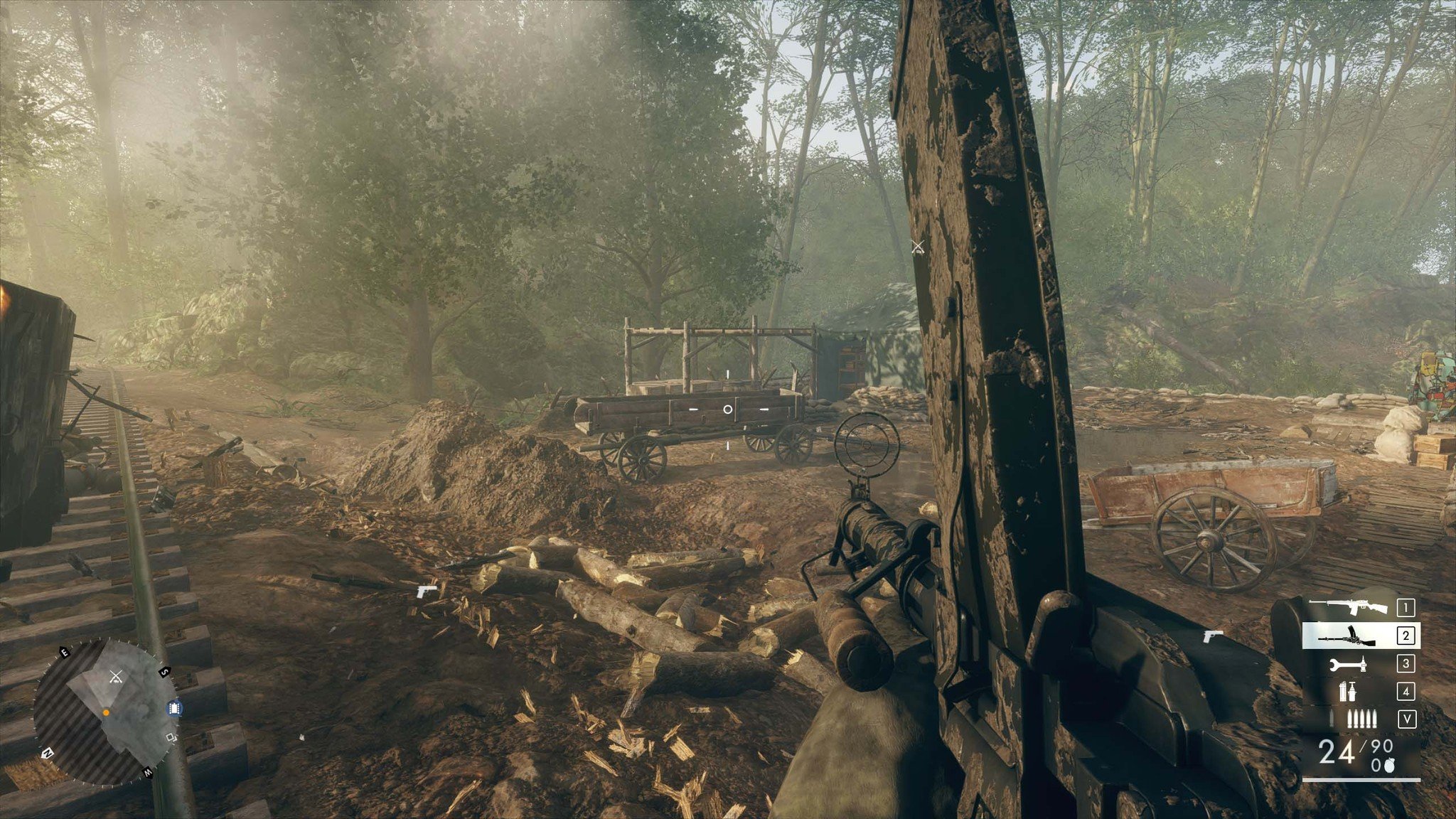Run along the road at the back of the base until you arrive at the small weapons cache in a green tent.