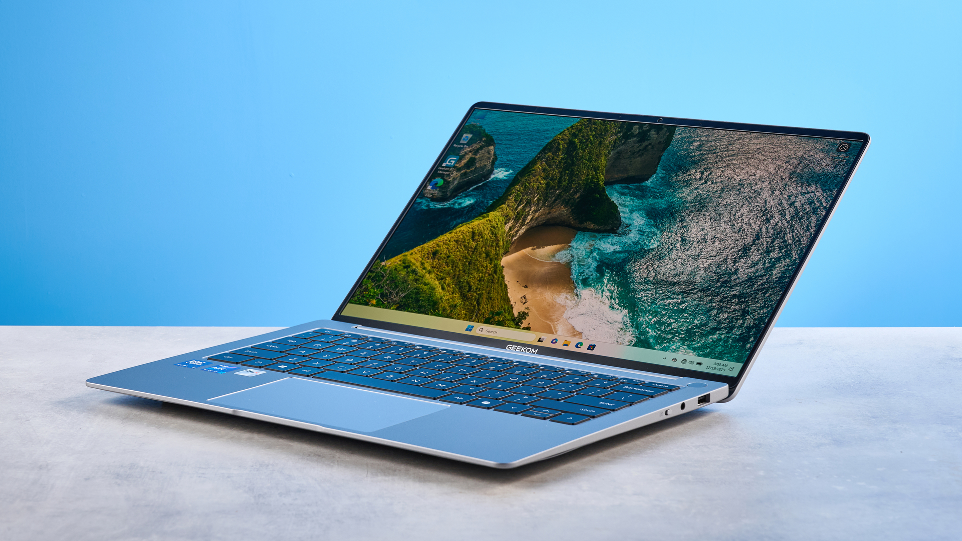 A silver Geekom GeekBook X14 Pro Windows laptop