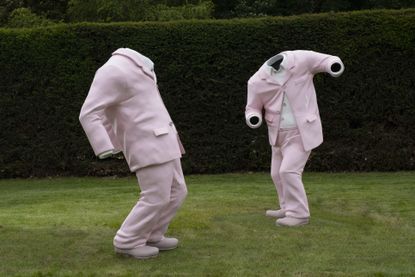 Two dancing pink suits, Erwin Wurm artwork at Yorkshire Sculpture Park