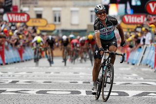 Tony Martin (Etixx-QuickStep) escaped to win stage 4 of the 2015 Tour de France and take the maillot jaune