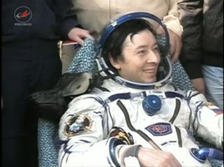 Russian cosmonaut Sergei Revin smiles after landing with his Expedition 32 crew.