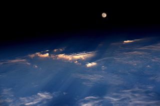 The full moon, photographed on June 20, 2016, from the International Space Station by astronaut Jeff Williams. According to Williams, the shot was taken while the station was flying over western China.