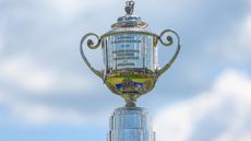 The Wanamaker Trophy seen against a blue and cloudy sky