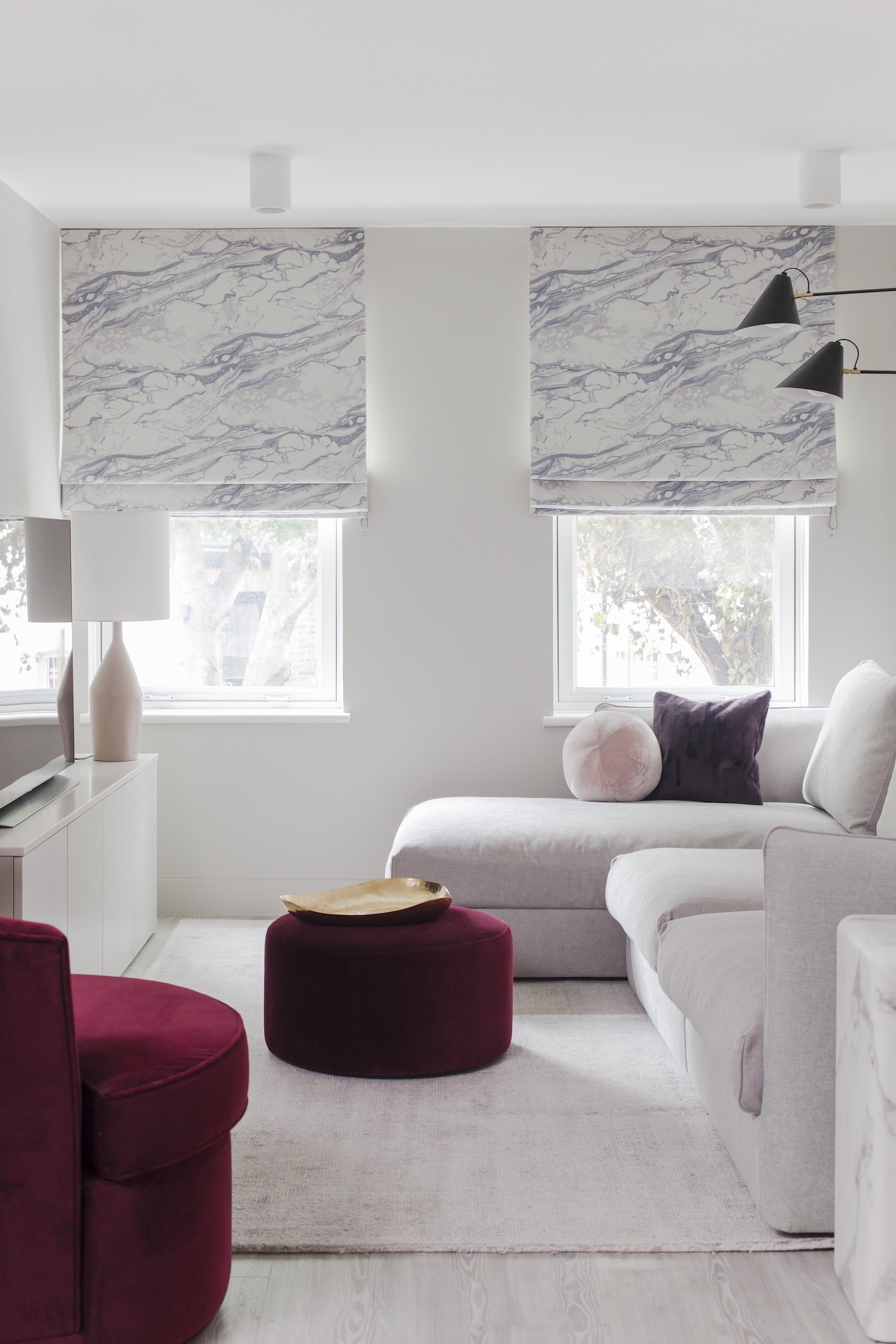 Small white living room with corner sofa