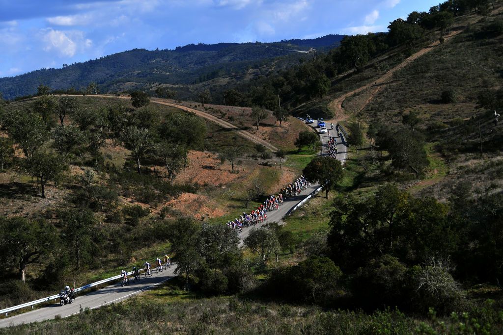 LOULE PORTUGAL FEBRUARY 20 A general view of the peloton passing through a landscape during the 48th Volta Ao Algarve 2022 Stage 5 a 173km stage from Lagoa to MalhoLoul 514m VAlgarve2022 on February 20 2022 in Loule Portugal Photo by Luc ClaessenGetty Images