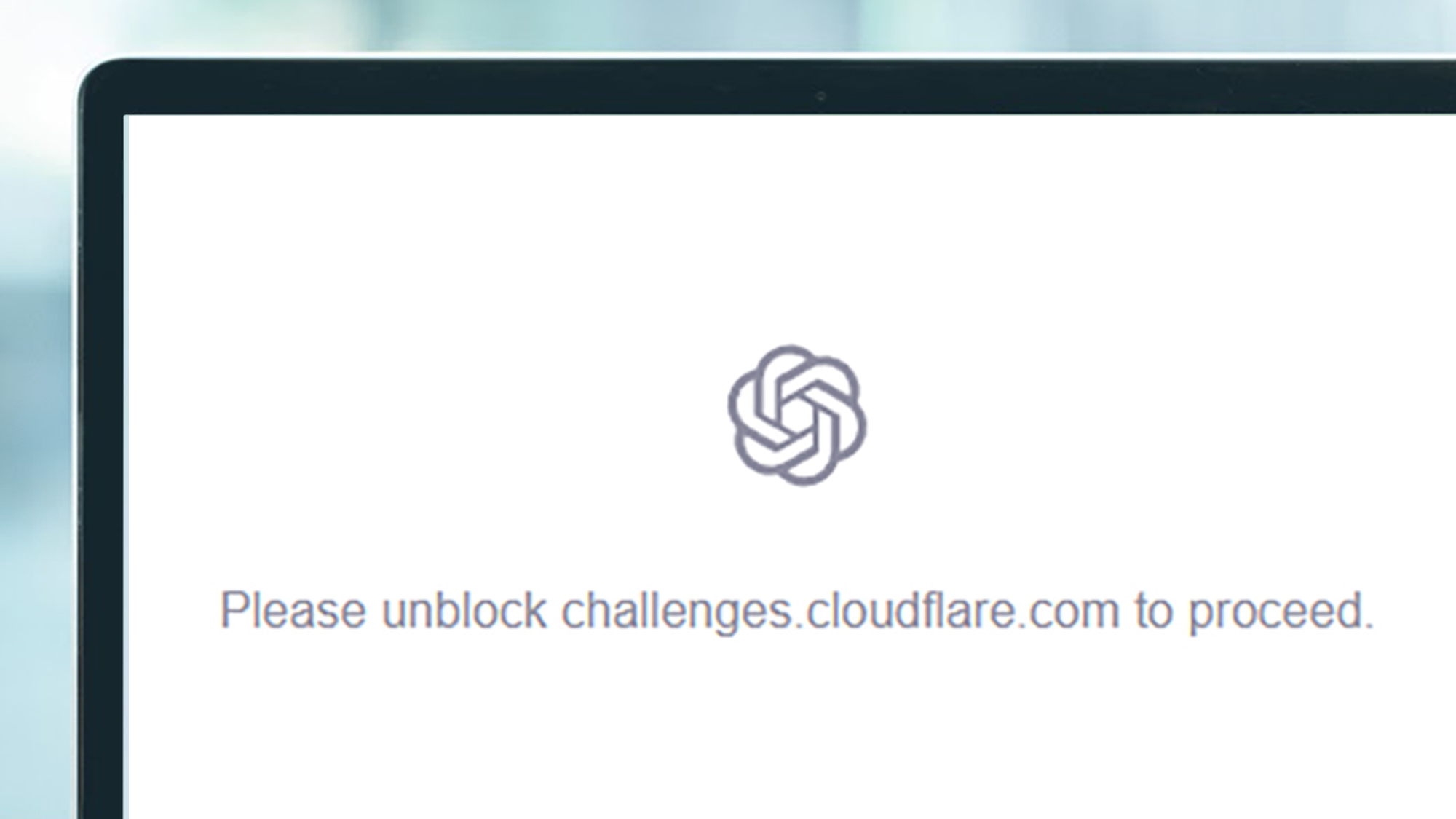 A laptop screen showing a ChatGPT error message
