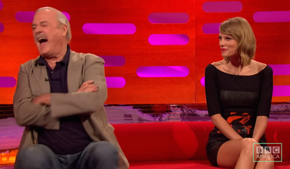 Watch Taylor Swift and Monty Python's John Cleese fight about their cats