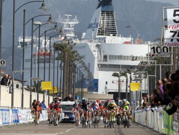A passenger ship rears in the distance as the sprint heads for the finish