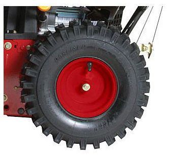Craftsman Quiet image: The large tires dig into snow and ice so you can control the snow blower.