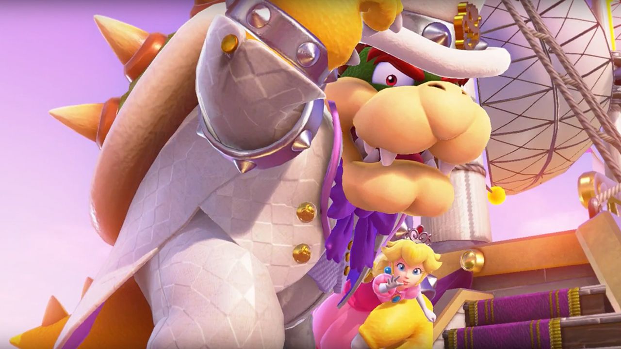 Screenshot from Super Mario Odyssey featuring Bowser holding Princess Peach.