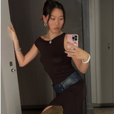 Woman in chocolate brown dress