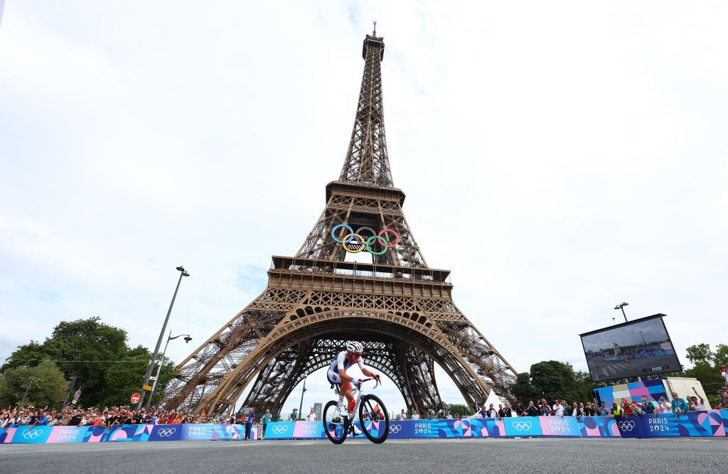 PARIS FRANCE AUGUST 03 Valentin Madouas of Team France competes with the Eiffel Tower in the background during the Mens Road Race on day eight of the Olympic Games Paris 2024 at trocadero on August 03 2024 in Paris France Photo by Buda MendesGetty Images