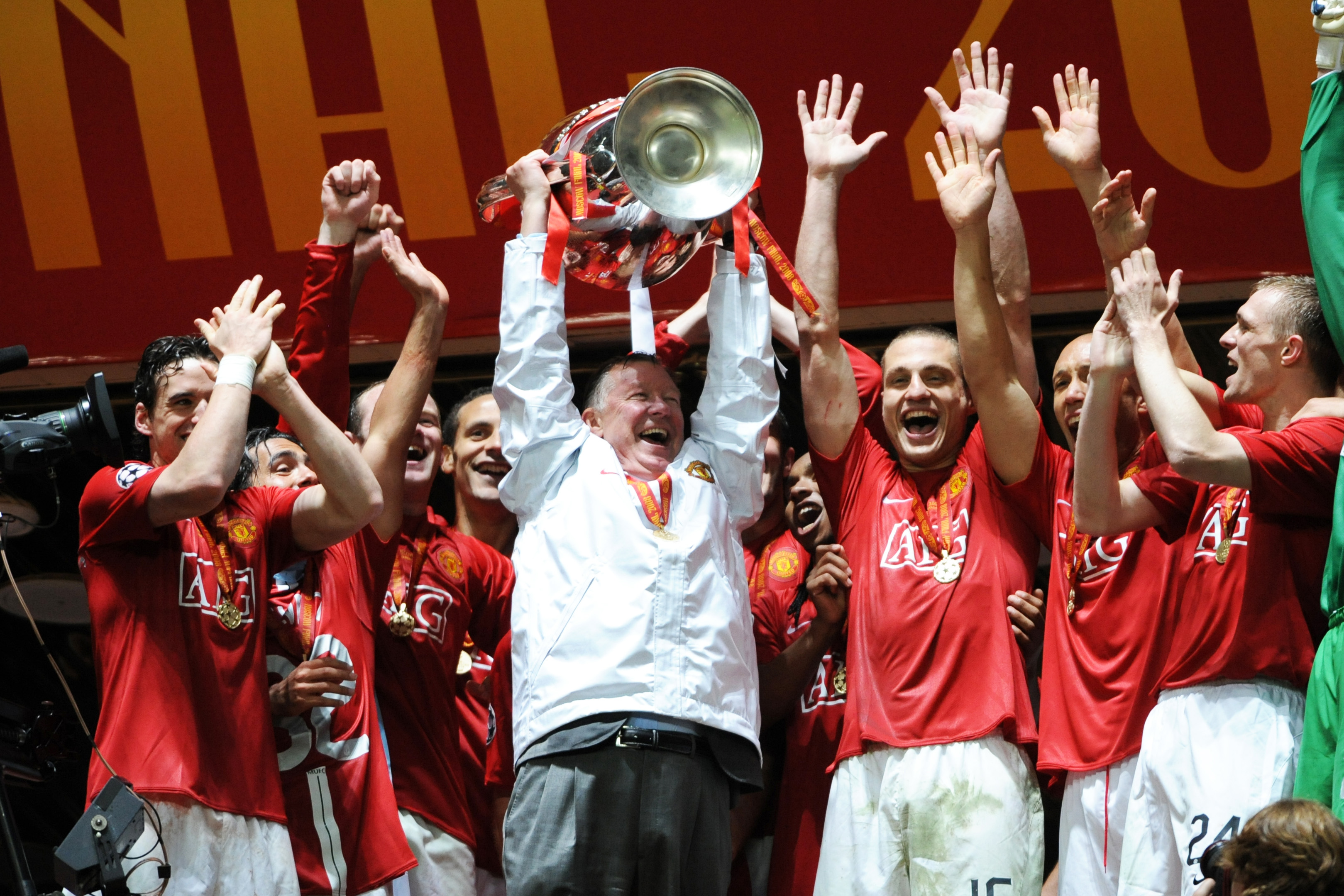 Sir Alex Ferguson celebrates with the Champions League trophy after Manchester United's win against Chelsea on penalties in the 2008 final.