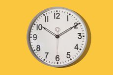 Wall clock showing 10:10 on a yellow background. Time, hour, minute, second, measuring instrument.