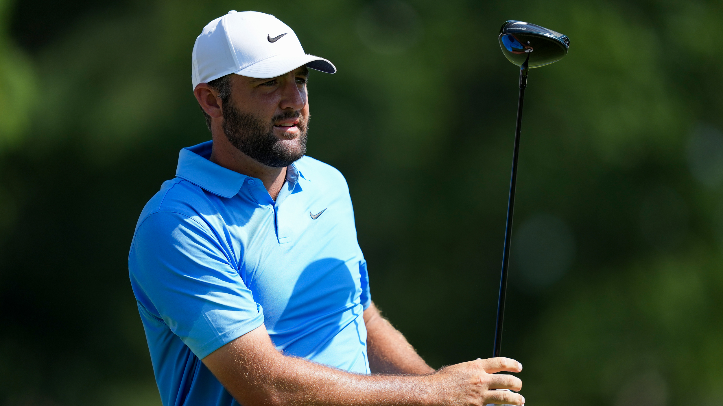 Scottie Scheffler watches a drive at the FedEx St Jude Championship