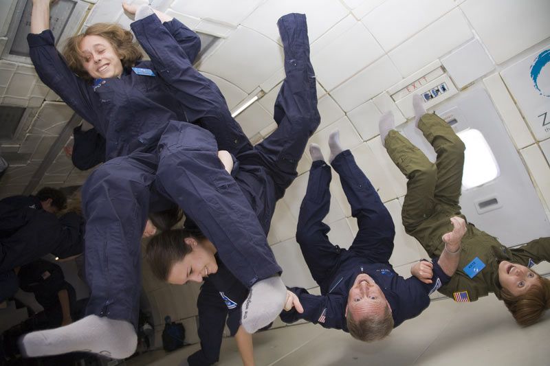 The Stern family of Colorado float in weightlessness during a Fourth of July holiday flight aboard a Zero Gravity Corporation aircraft on July 4, 2010.