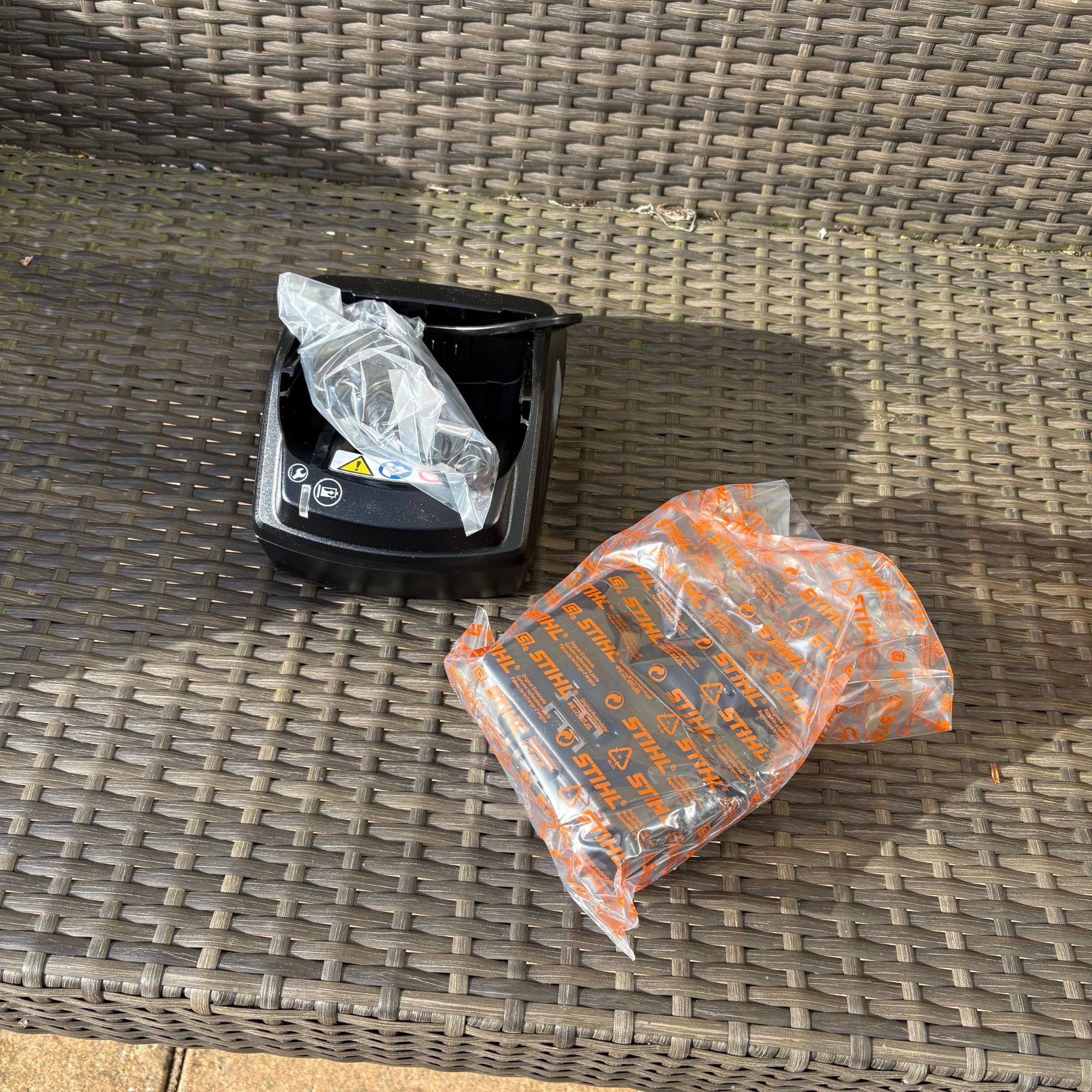 STIHL FSA 50 Cordless Grass Trimmer battery and charger in packaging