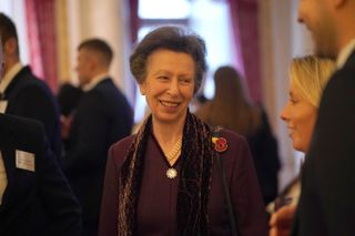 Princess Anne, Princess Royal speaks with guests during a reception for medalists from the Paris 2024 Olympic and Paralympic Games at Buckingham Palace on November 7, 2024 in London, England.