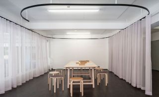 A private space for the workshops with long curtains