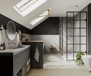 loft conversion bathroom with dark and light grey walls, raised floor with bath and shower cubicle, large vanity unit and two velux windows