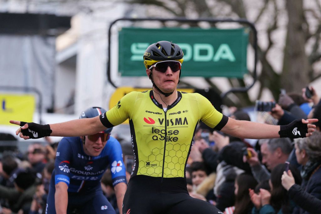 Image shows Olav Kooij winning Stage 1 of the 2024 Paris-Nice