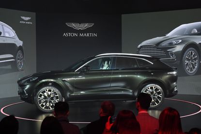 Aston Martin's DBX SUV is seen at its world premiere in Beijing on November 20, 2019. - Aston Martin launched its first ever SUV in the Chinese capital on November 20. (Photo by GREG BAKER / 