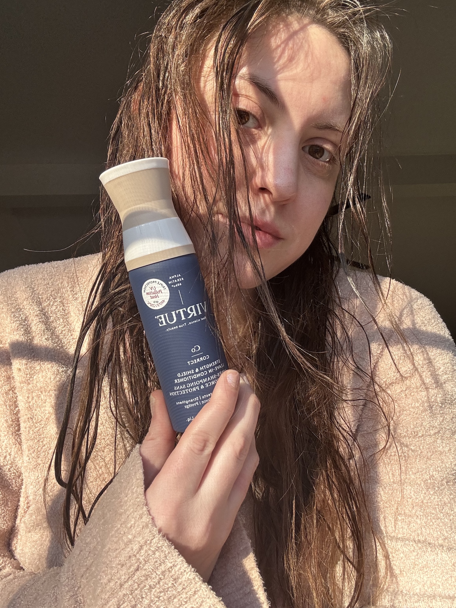 Sophia Vilensky before using Virtue Leave-In Conditioner.