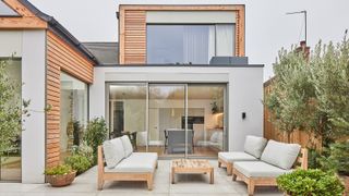 The rear exterior of a contemporary renovation of a bungalow