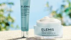 Two Elemis products on the side of a wall.