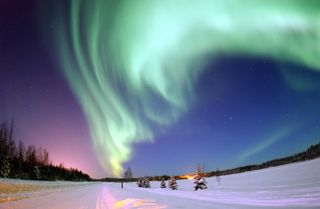 An auroral display over Bear Lake, Alaska in 2005.