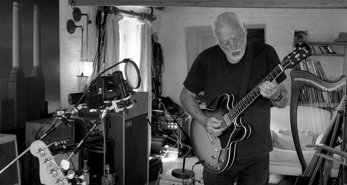 A black-and-white photo of David Gilmour tracking his new solo album, Luck and Strange, in the studio