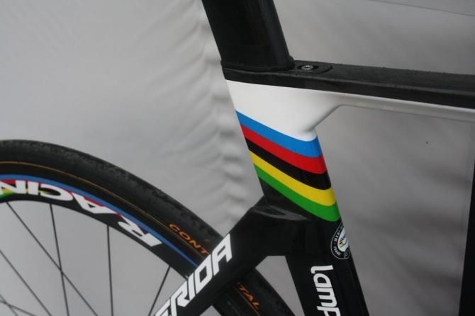 Rainbow stripes bedeck the frame's muscular seat-tube