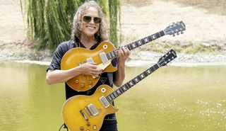 Kirk Hammett holds two 'Burst Les Pauls – "Greeny" and "Gemini"