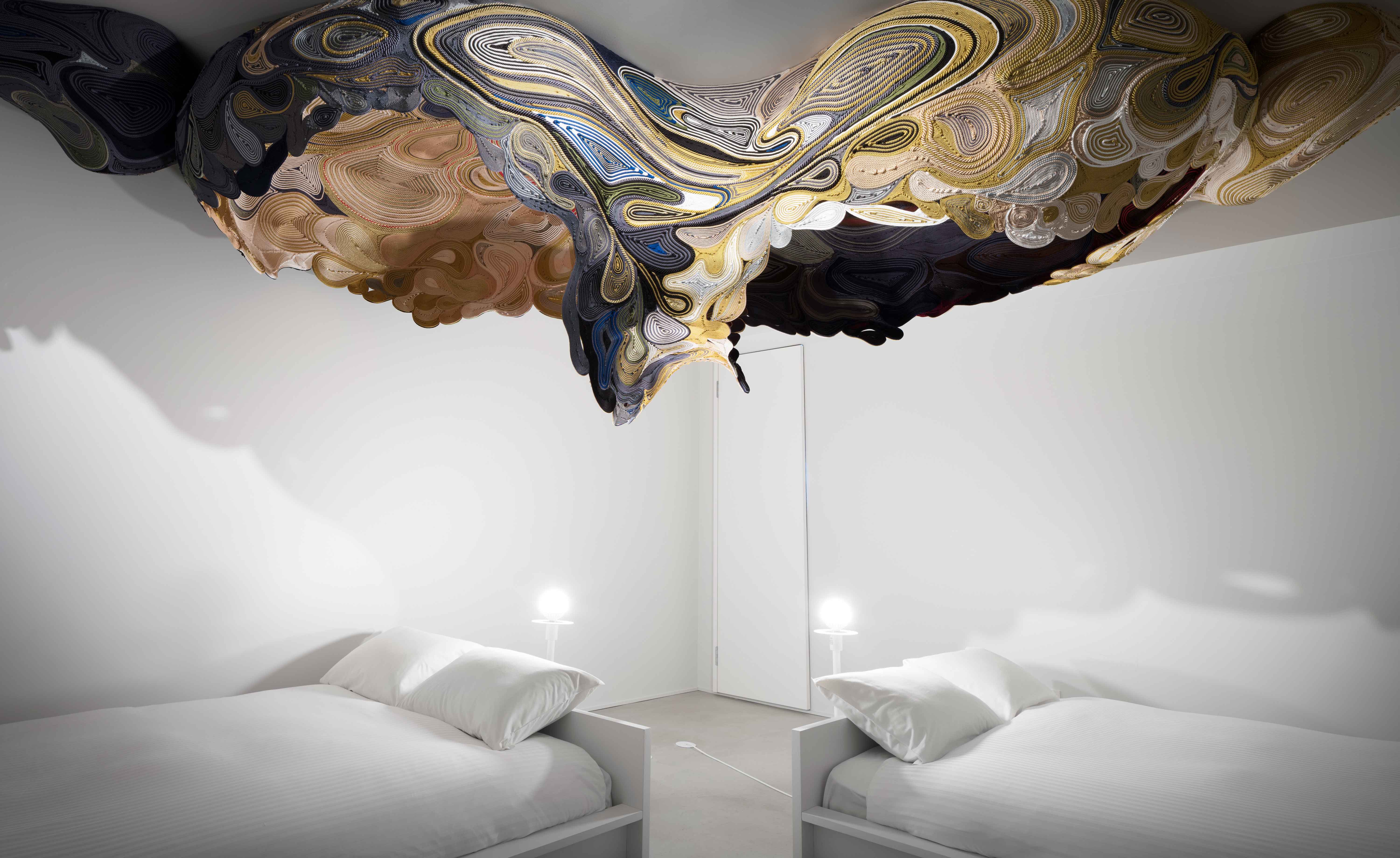 Close view of ceiling art in a room at the BnA Alter Museum — Kyoto