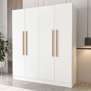 A white four door wardrobe