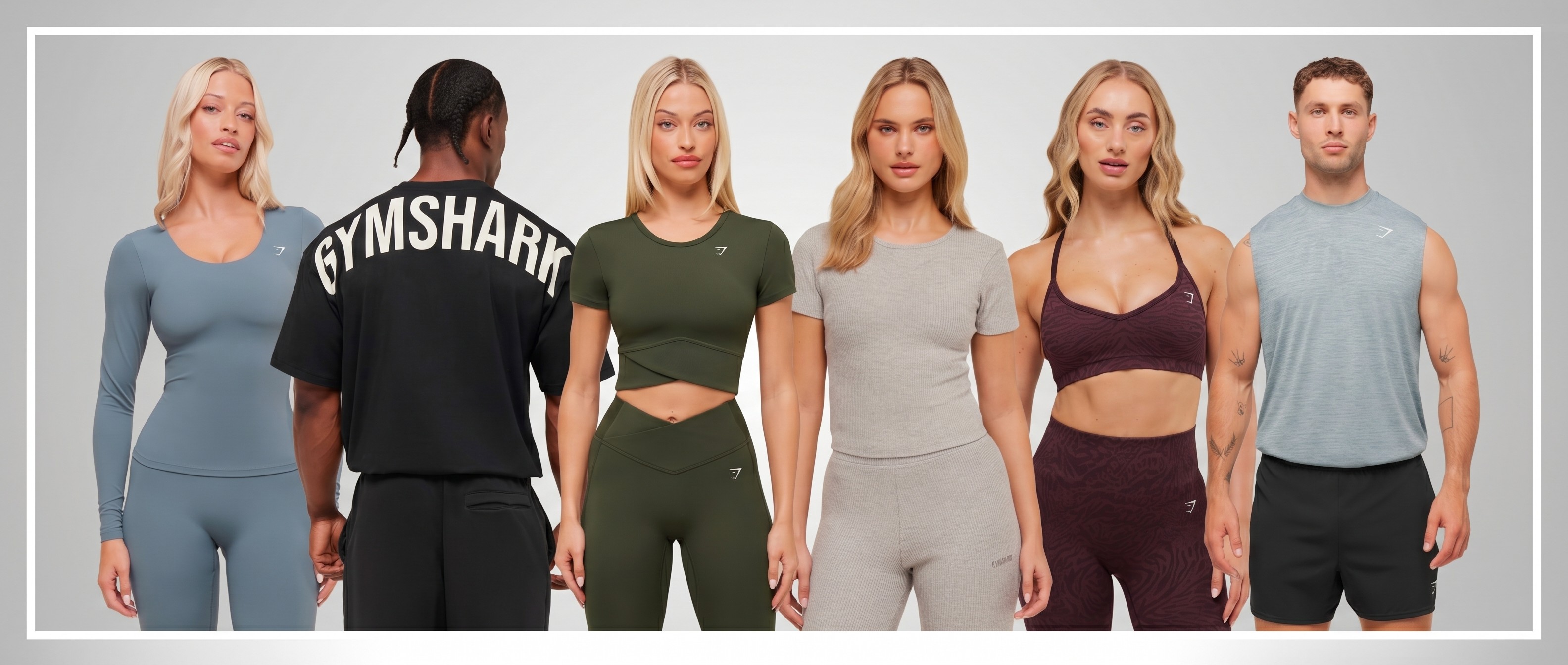 Models wearing gymshark clothing on grey background
