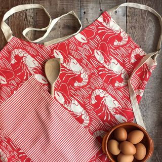 lobster apron with eggs on wooden table
