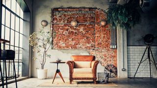 A living space with exposed brick