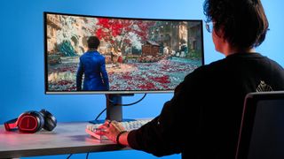 An MSI MPG 341CQR QD-OLED X36 gaming monitor in black