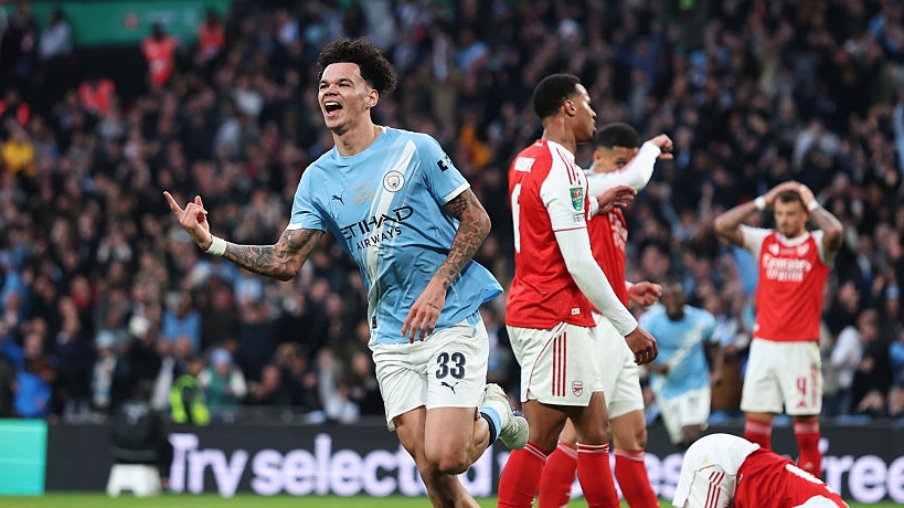 Nico O'Reilly of Manchester City celebrates scoring his team's first goal during the Carabao Cup Final match between Arsenal and Manchester City. 