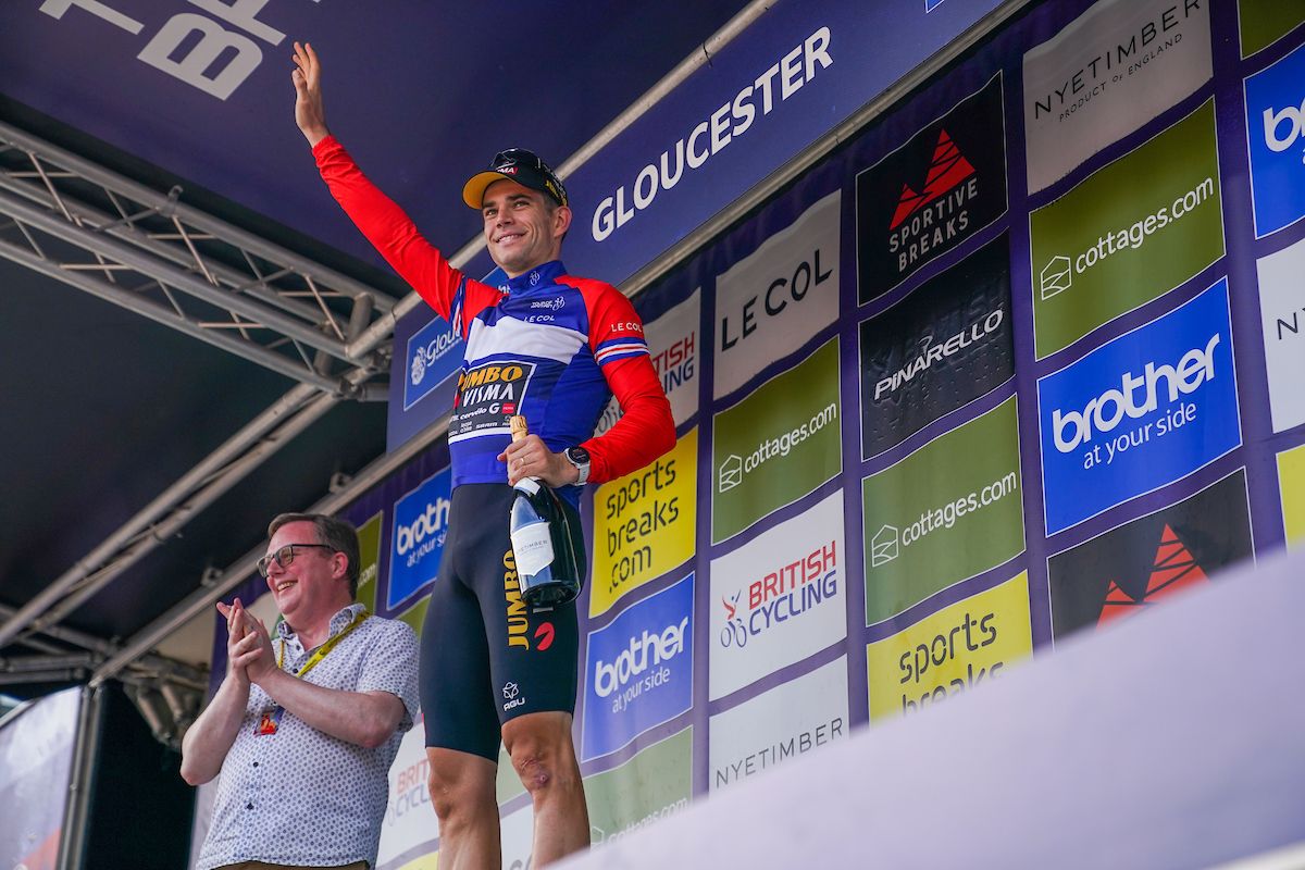 Picture by Zac Williams/SWpix.com - 09/09/2023 - Cycling - 2023 Tour of Britain - Stage 7: Tewkesbury to Gloucester (170.9km) - Wout van Aert of Team Jumbo Visma (Wearing the Leaders Jersey) on the podium leading the General classification