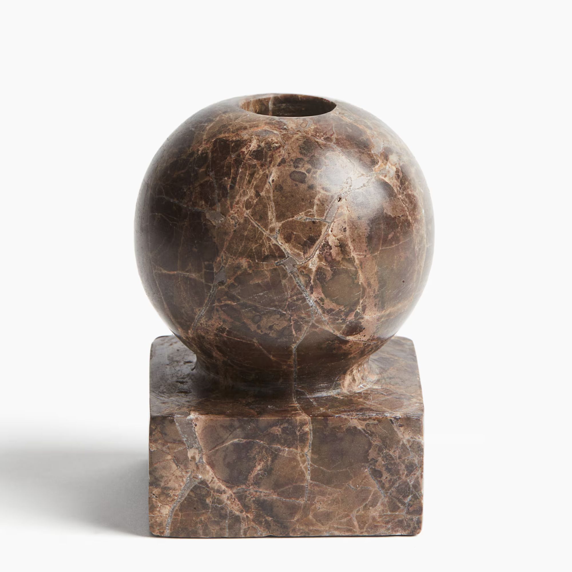 Brown marble candlestick holder with square base and spherical rim