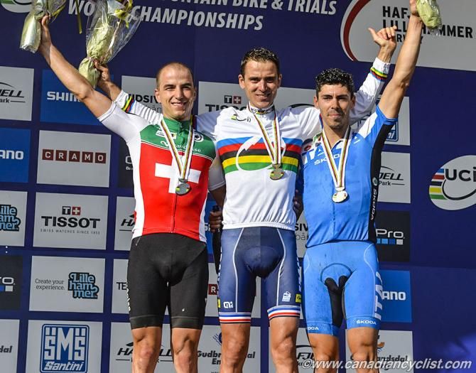 Elite men's cross country podium at the 2014 world championships: Nino Schurter (Switzerland), Julien Absalon (France), Marco Fontana (Italy)