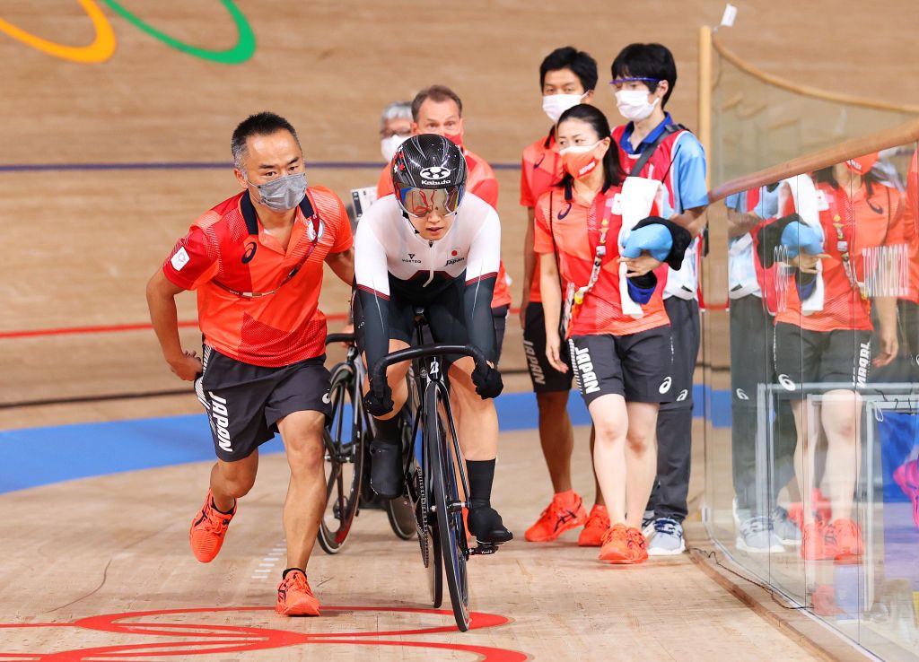 IZU JAPAN AUGUST 08 Yumi Kajihara of Team Japan is driven by her coach after falling during the Womens Omnium points race 4 round of 4 of the track cycling on day sixteen of the Tokyo 2020 Olympic Games at Izu Velodrome on August 08 2021 in Izu Shizuoka Japan Photo by Justin SetterfieldGetty Images
