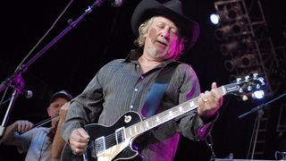 John Anderson plays his trusty Les Paul onstage at Atlanta's Country Kicks 101.5 and Eagle 106.7 Present Country Fair 2007.
