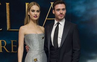 Richard Madden cuts a dashing figure alongside Downton Abbey actress and Cinderella star Lily James at the UK Premiere
