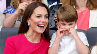 Kate Middleton laughing while Prince Louis makes a funny face