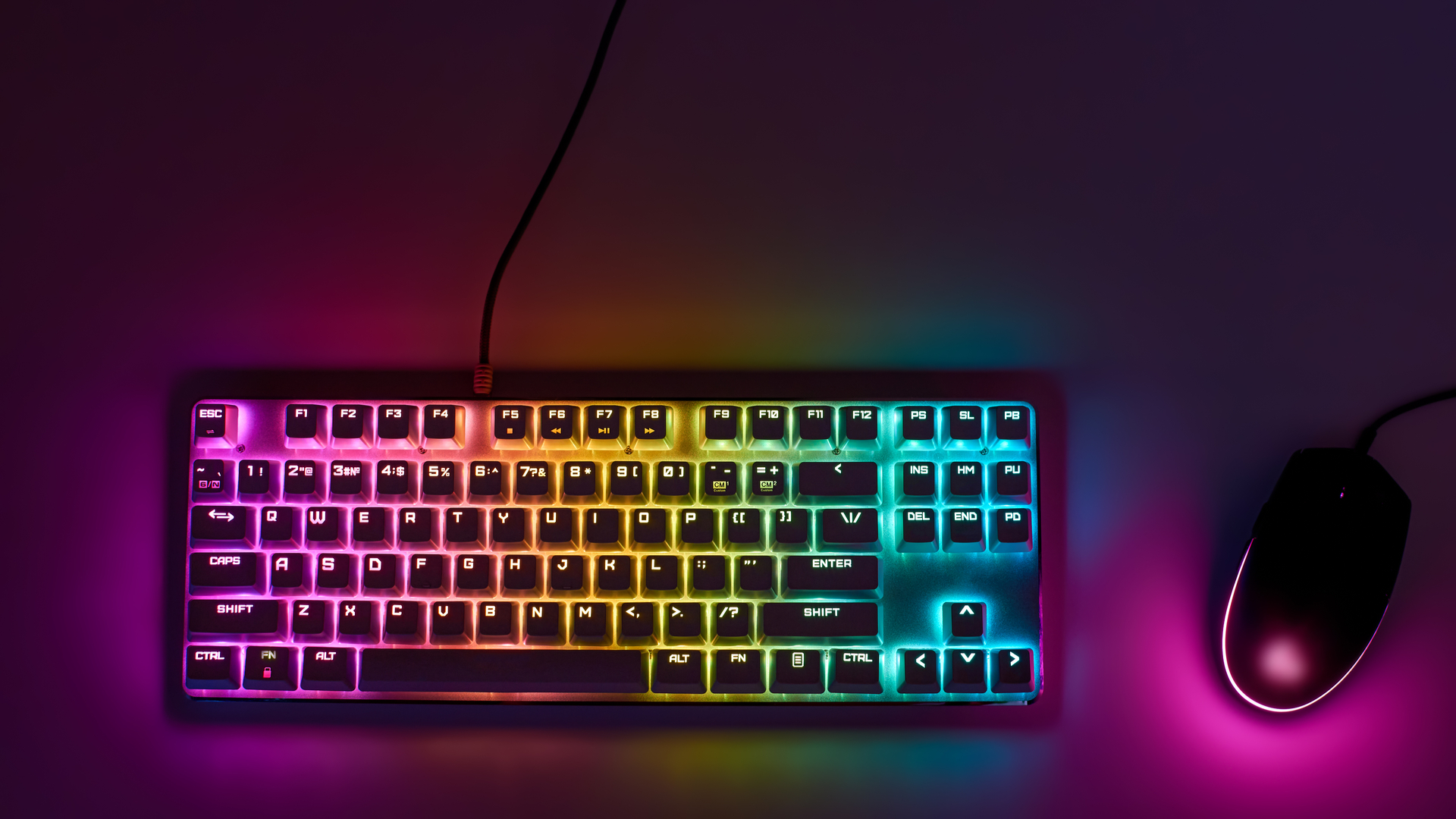 An RGB keyboard and gaming mouse with rainbow lights